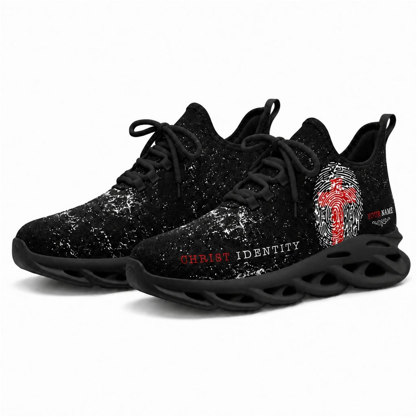 Angled studio shot of black-soled religious footwear featuring the Christ Identity design