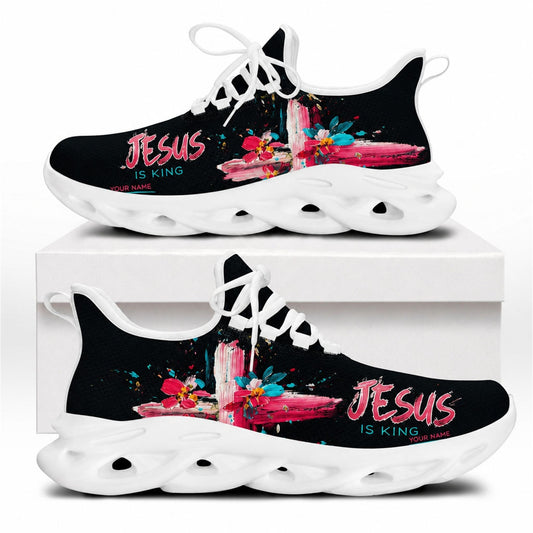 Side profile of Christian Jesus shoes showcasing the vibrant pink abstract paint cross on white outsoles