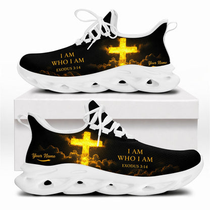 Side profile of Christian Jesus sneakers showing the bright illuminated cross and gold text on white outsoles