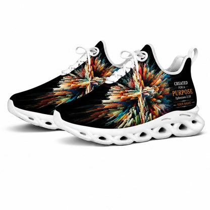 Studio 3/4 angle of gym sneakers featuring an abstract cross design on white soles