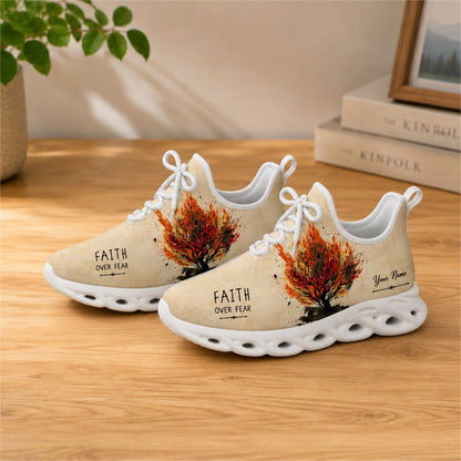 Lifestyle view of white-soled faith sneakers on a wooden surface, showcasing the burning tree and custom name
