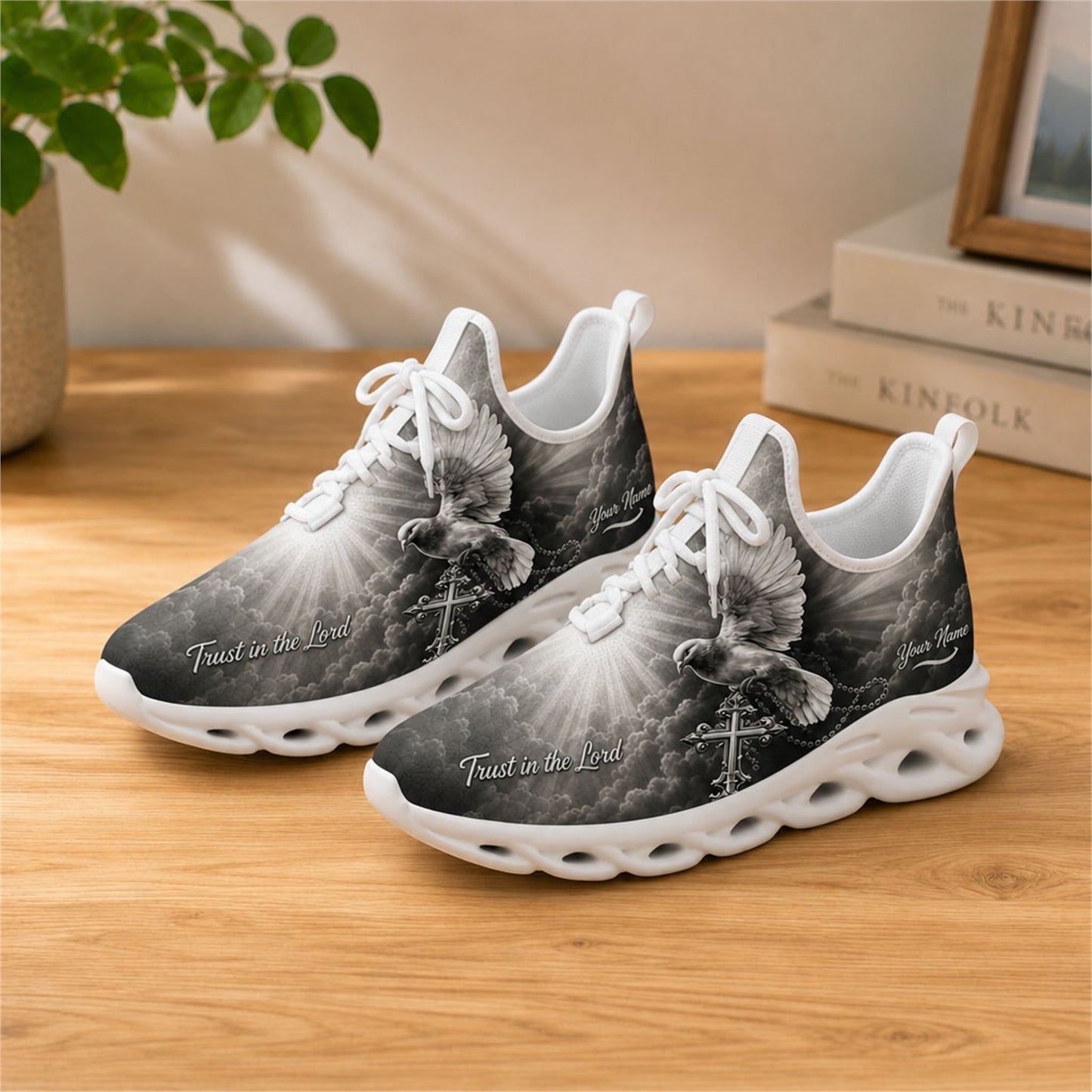 Lifestyle view of white-soled faith footwear on a wooden table, showcasing the "Trust in the Lord" script