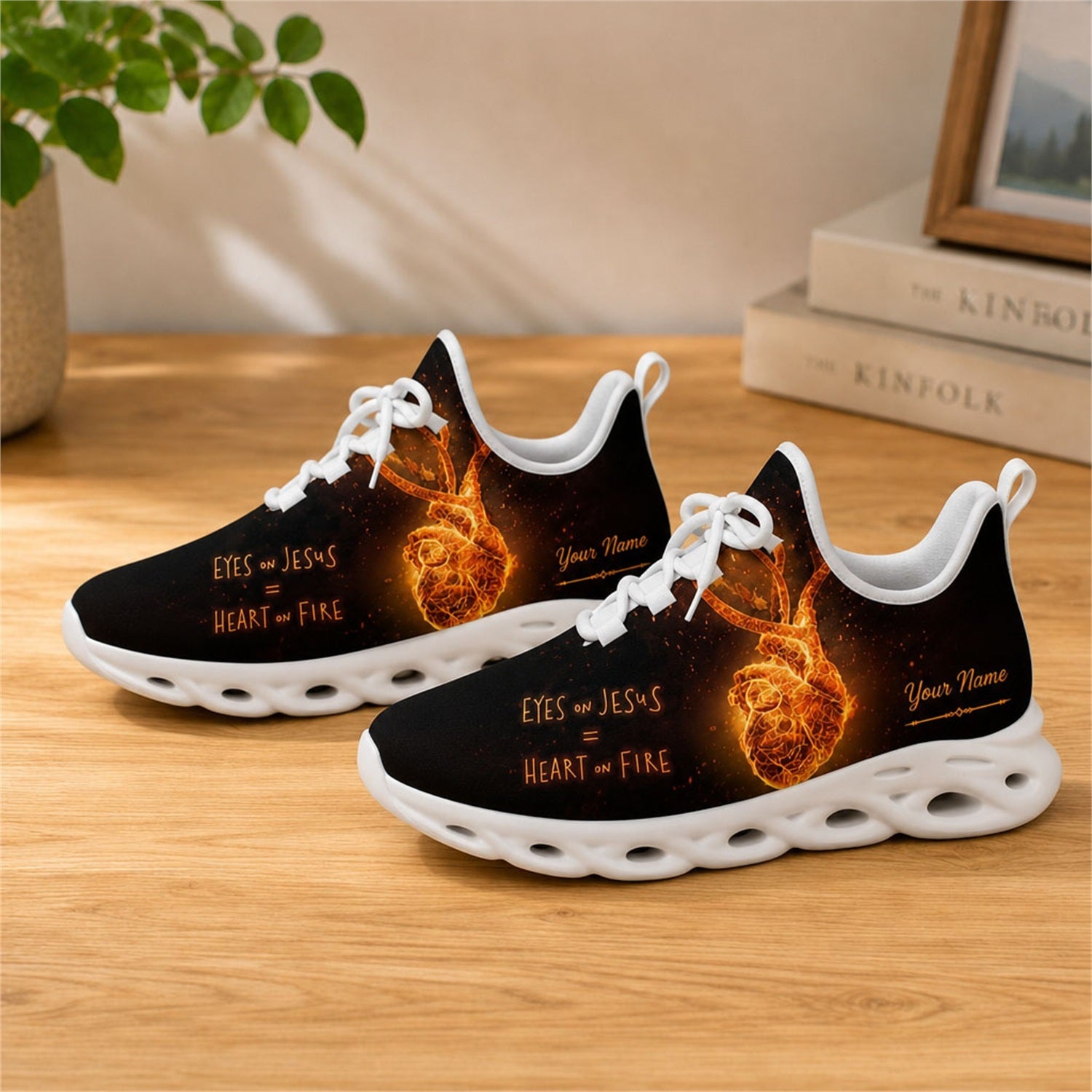 Lifestyle view of white-soled faith sneakers on a wooden surface, showcasing the fiery heart and custom name