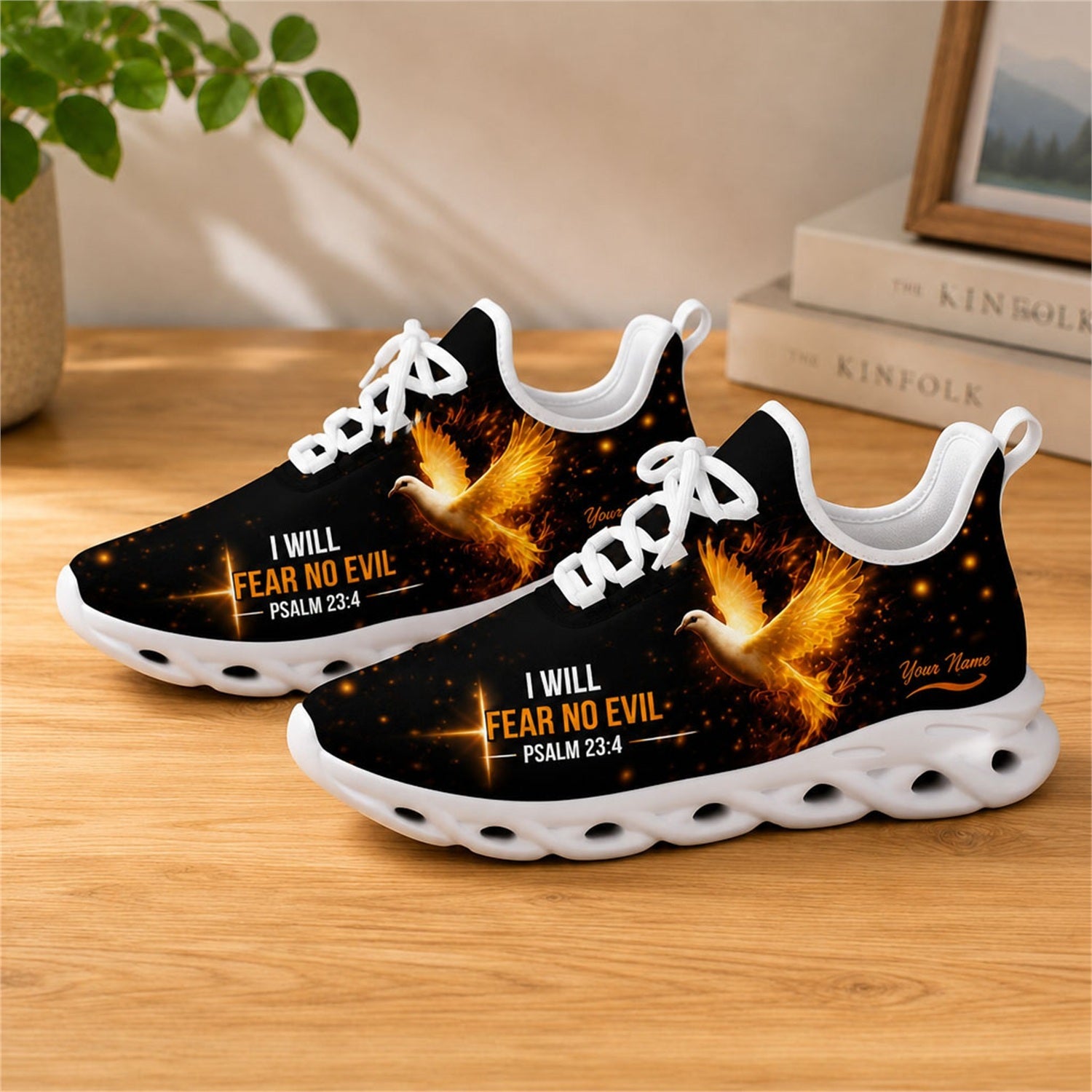 Lifestyle view of white-soled faith sneakers on wood, displaying personalized name zones and dynamic fire embers