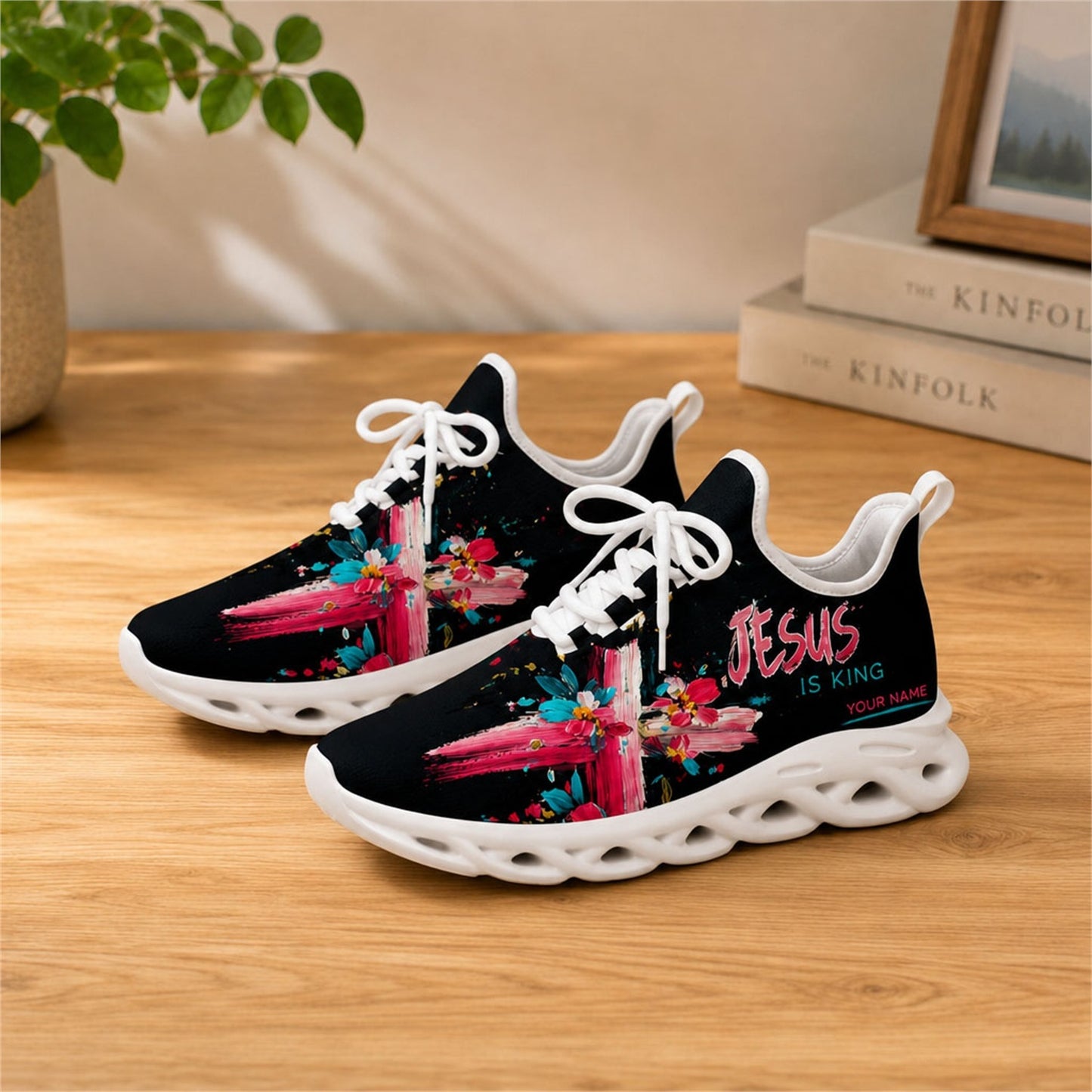 Lifestyle view of white-soled faith scripture sneakers on wood, displaying the personalized name zone