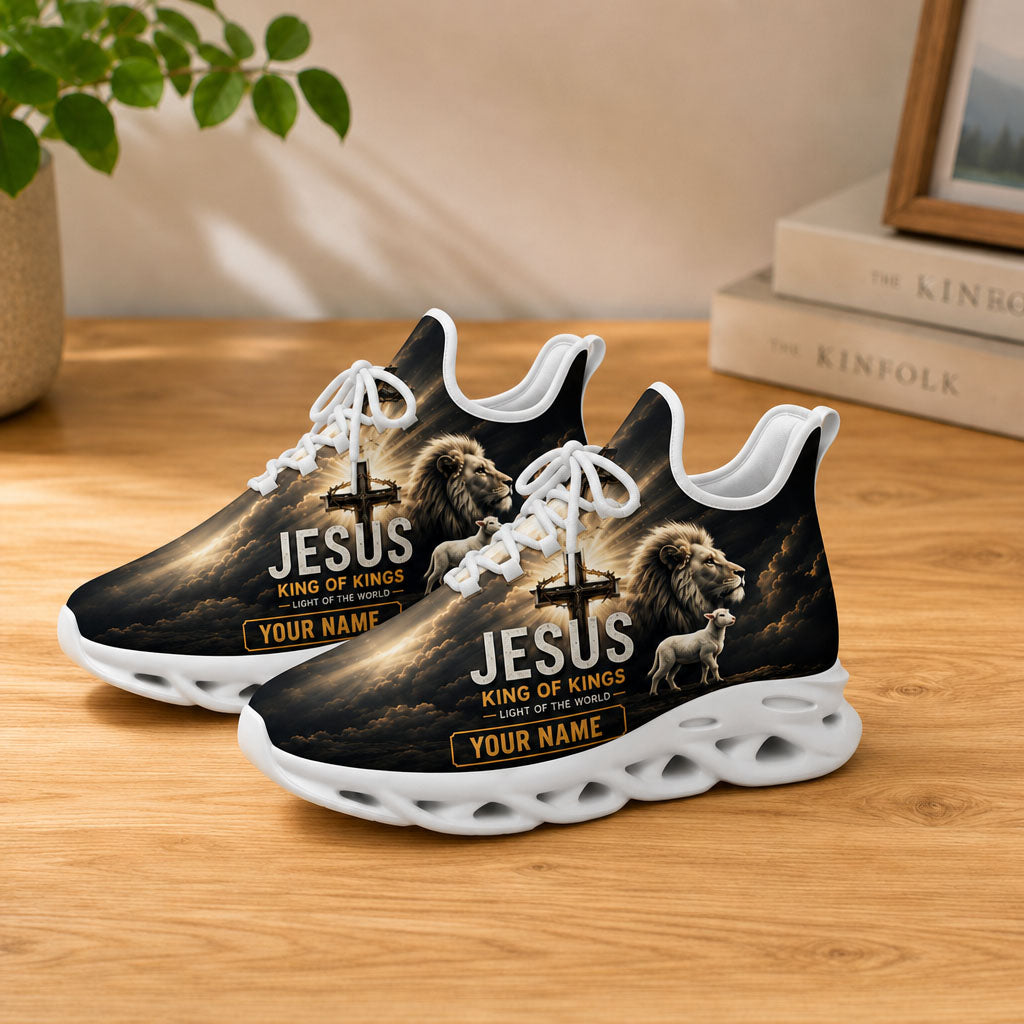Lifestyle presentation of the white-soled faith scripture running shoes on a wooden table, emphasizing the custom name block and holy cross icon