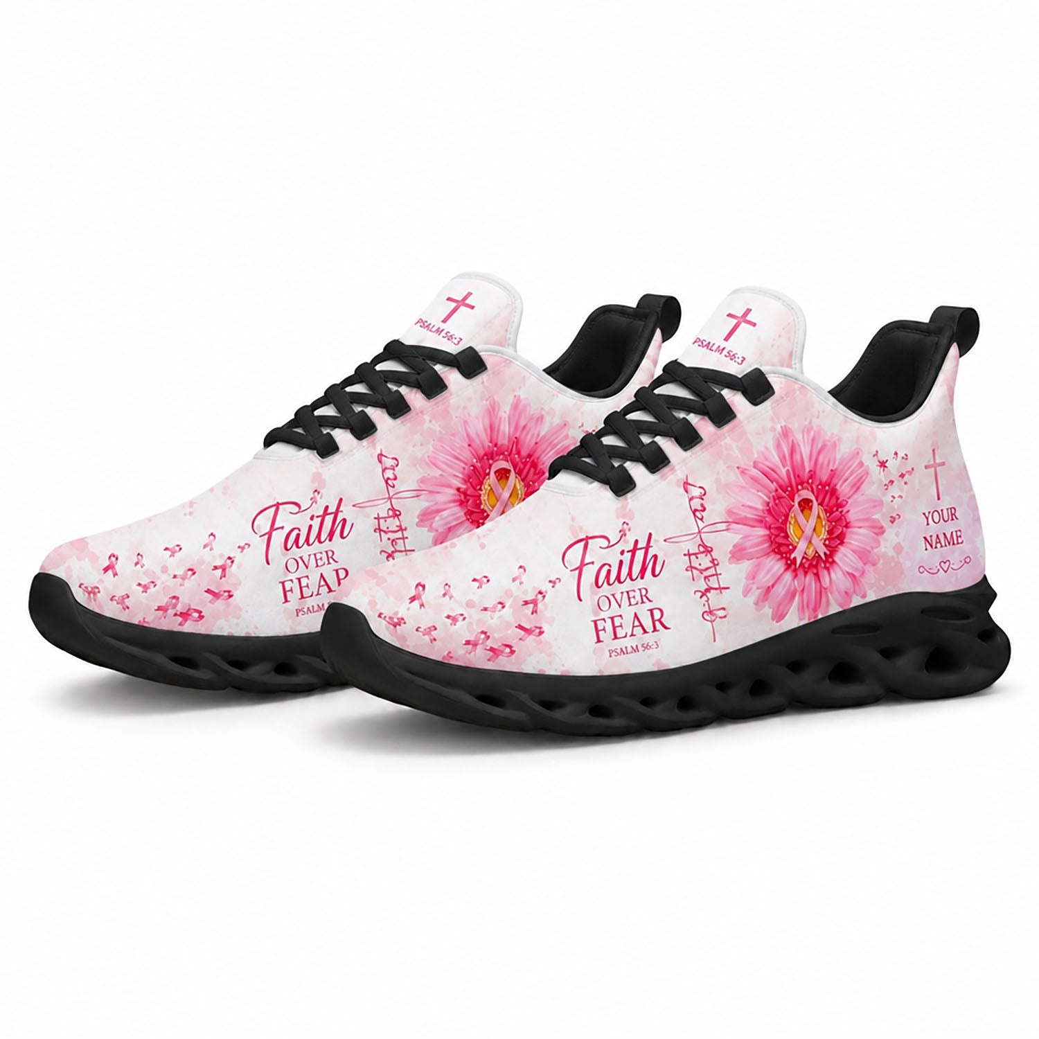 Pair of breast cancer awareness sneakers featuring a vibrant pink daisy canvas print with dynamic black traction soles