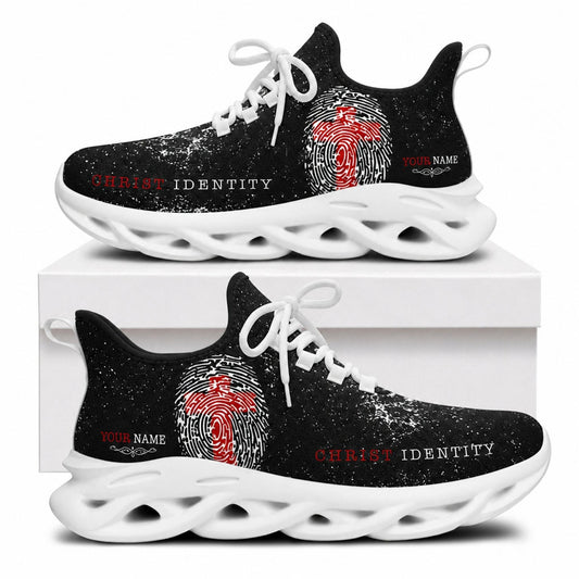Side view of faith sneakers with red cross fingerprint motif on white outsoles