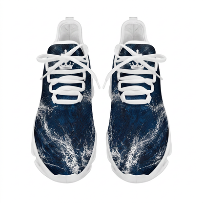 Top-down view of the custom sneakers showcasing the deep blue ocean wave prints and a white crown emblem on the tongue