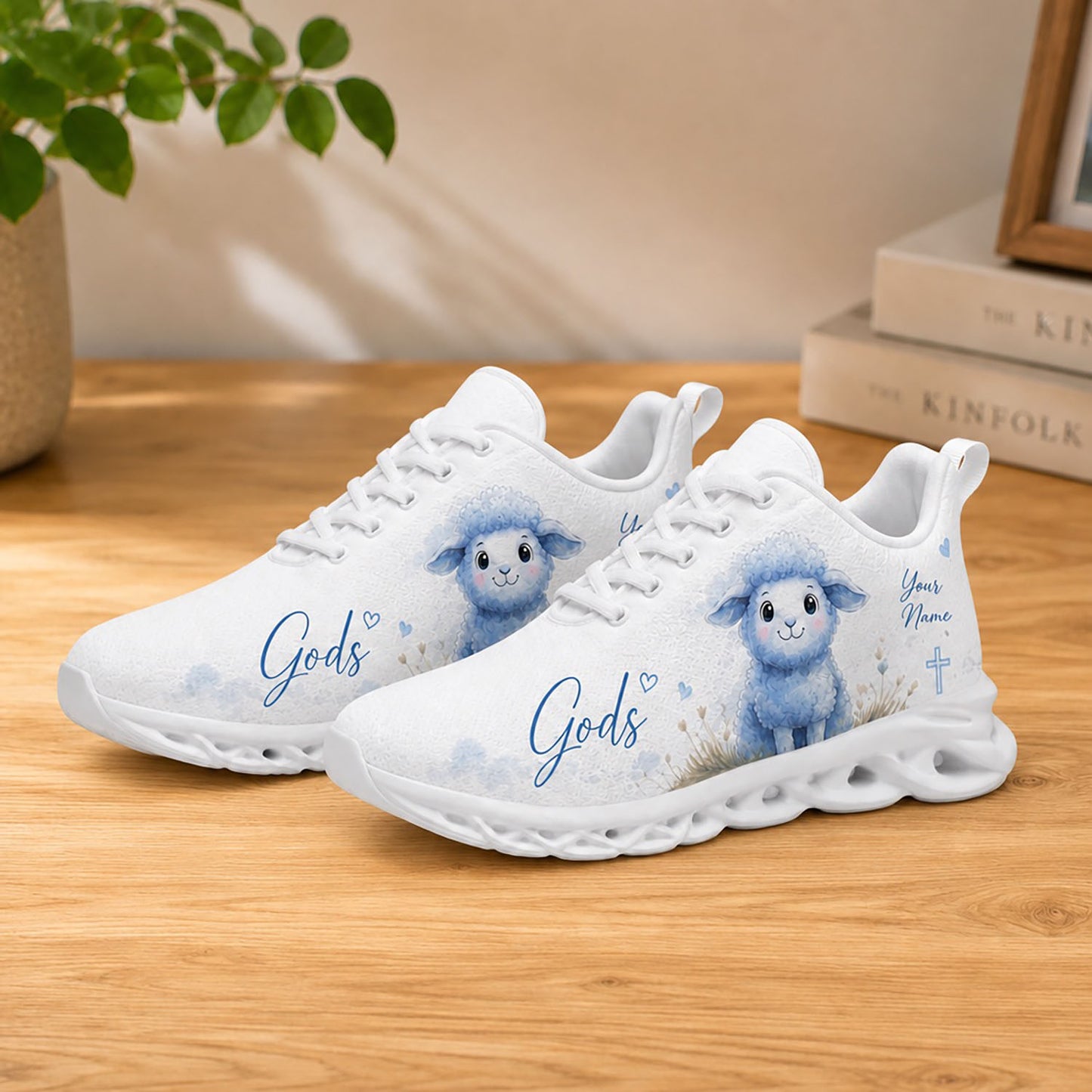 Lifestyle display of Custom Name Gods Little Lamb Max Soul shoes with white soles styled on a light wooden table