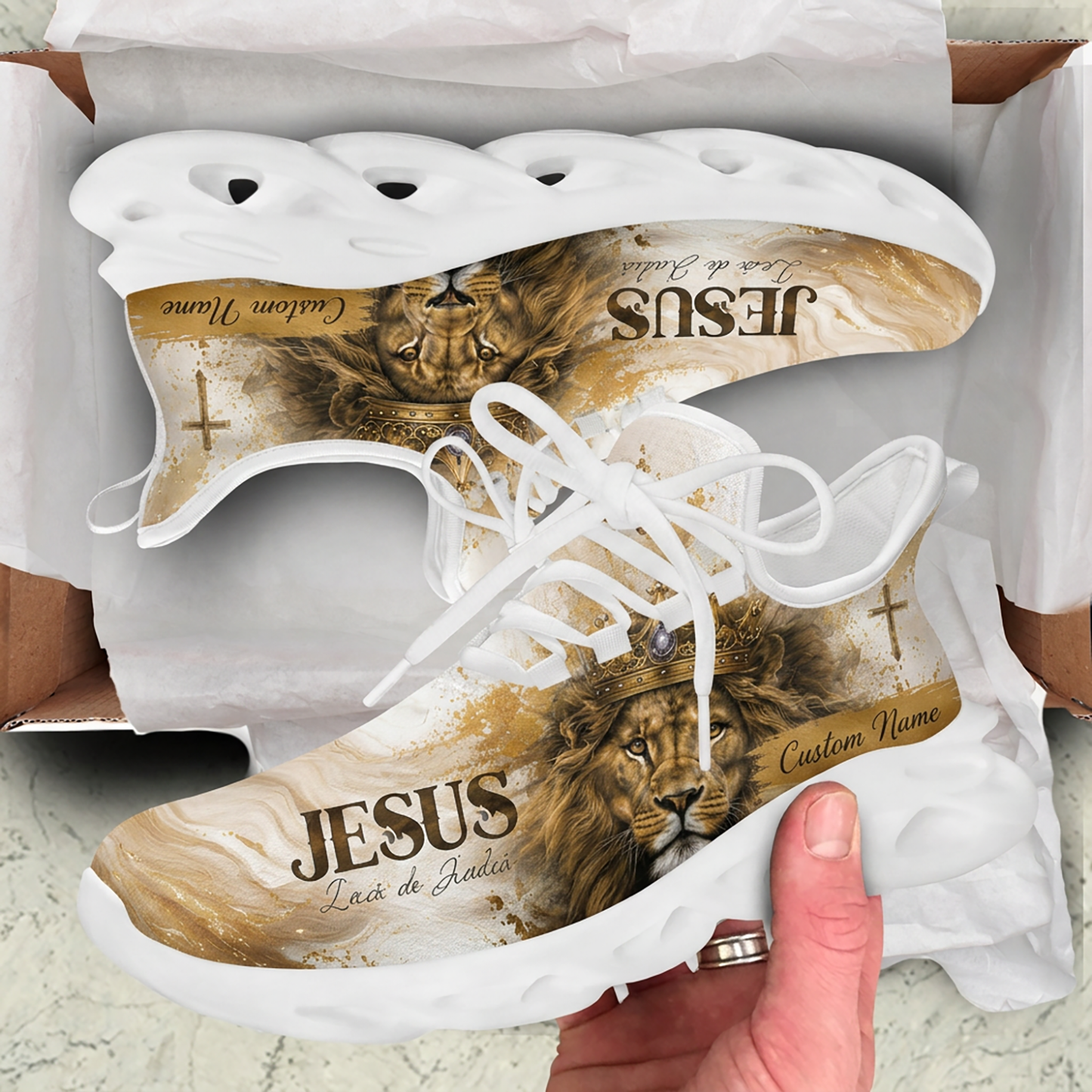 Unboxing showcase of Portuguese Christian sneakers featuring the Lion of Judah graphic inside a package box