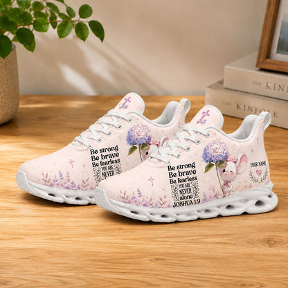 Lifestyle product photography of Custom Name Joshua 1:9 Max Soul shoes with white soles styled on a clean wooden table