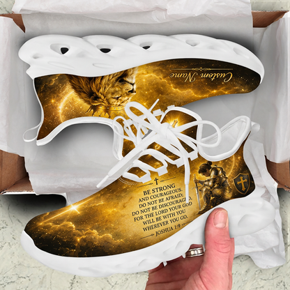 Unboxing display of the golden nebula sneakers inside a shipping box, highlighting the full Joshua 1:9 scripture quote printed on the side fabric