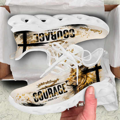 Unboxing perspective of the Portuguese Christian beige sneakers nested inside a cardboard shipping box