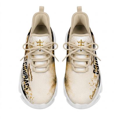 Top-down view of the custom sneakers showcasing the textured beige upper and a golden cross crown graphic on the tongue panels