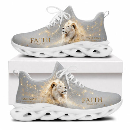 Side view of Lion of Faith sneakers with elegant gold lion graphic on white outsoles