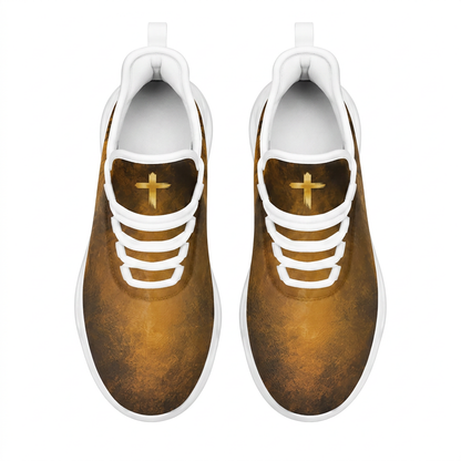 Top-down view of the custom sneakers showcasing the golden textured upper and a painted cross on the tongue panels