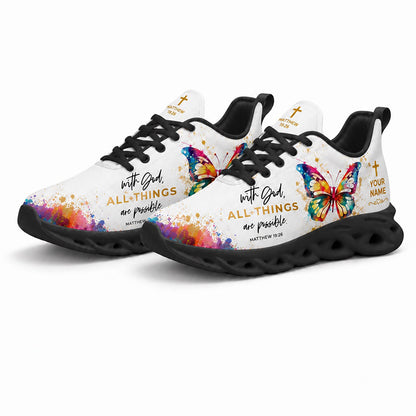 Pair of vibrant Christian butterfly sneakers featuring colorful ink splashes with dynamic black traction soles