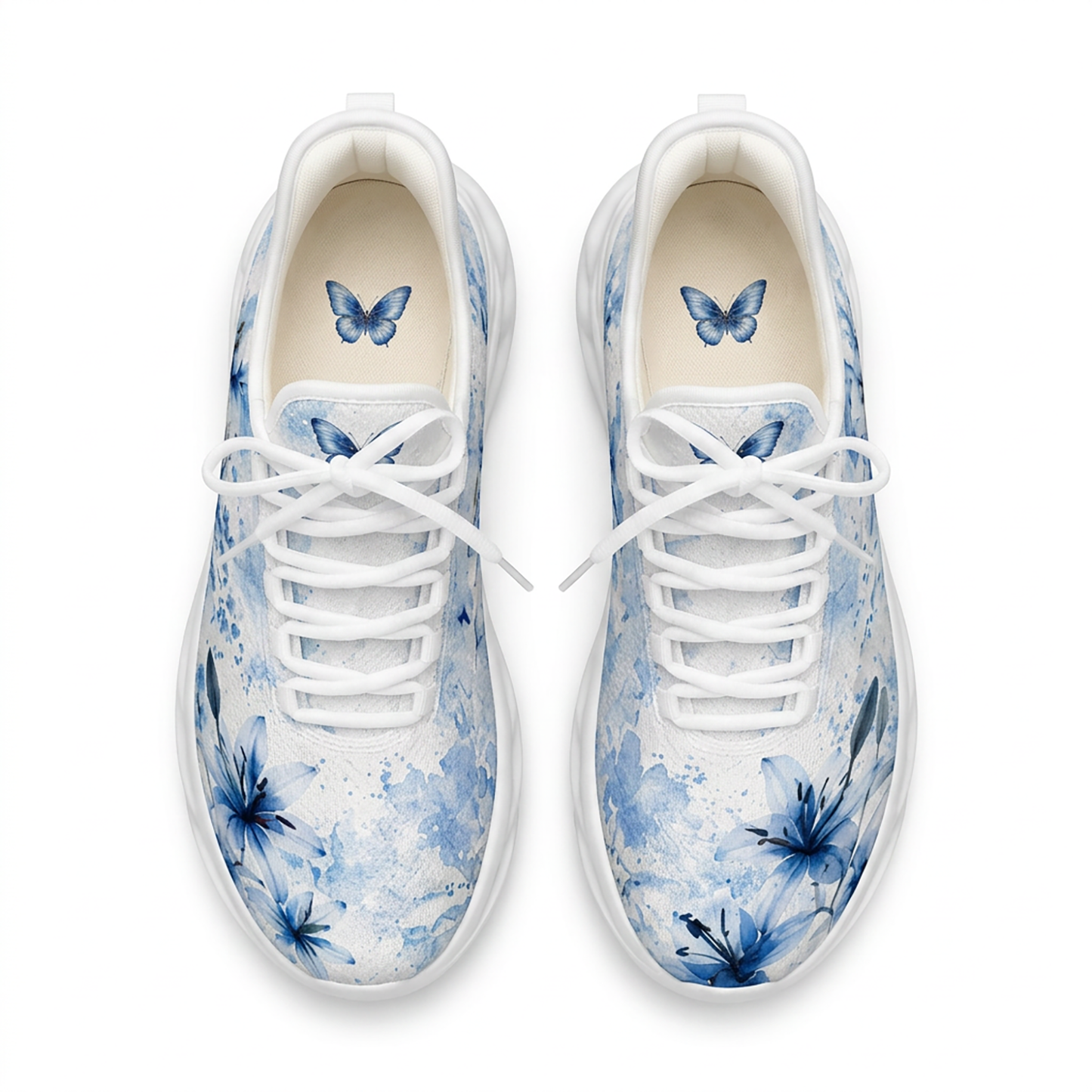 Close-up view of a person tying the laces of the white and blue butterfly Christian sneakers on outdoor pavement