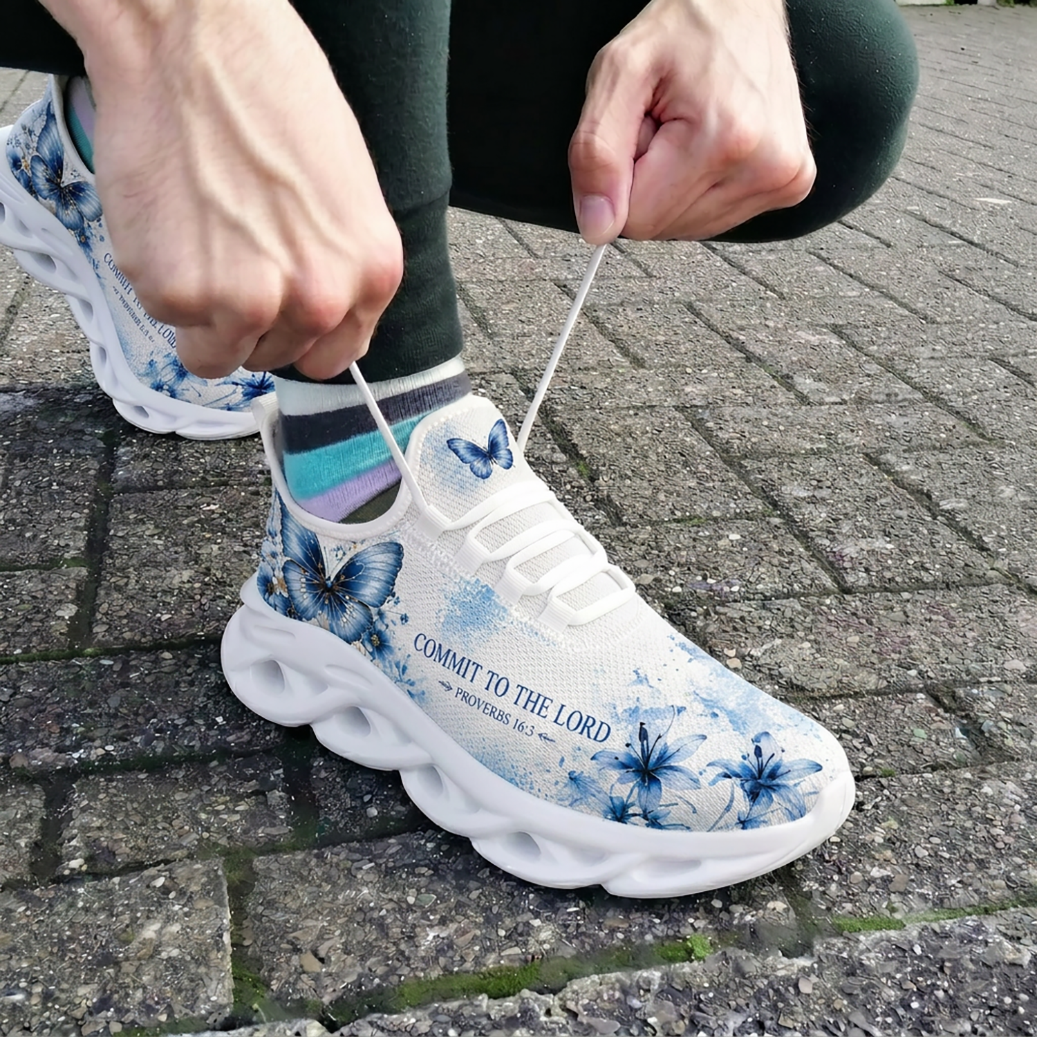 Side profiles of Custom Name Proverbs 16:3 Max Soul Shoes on white soles featuring elegant blue butterflies and floral graphics