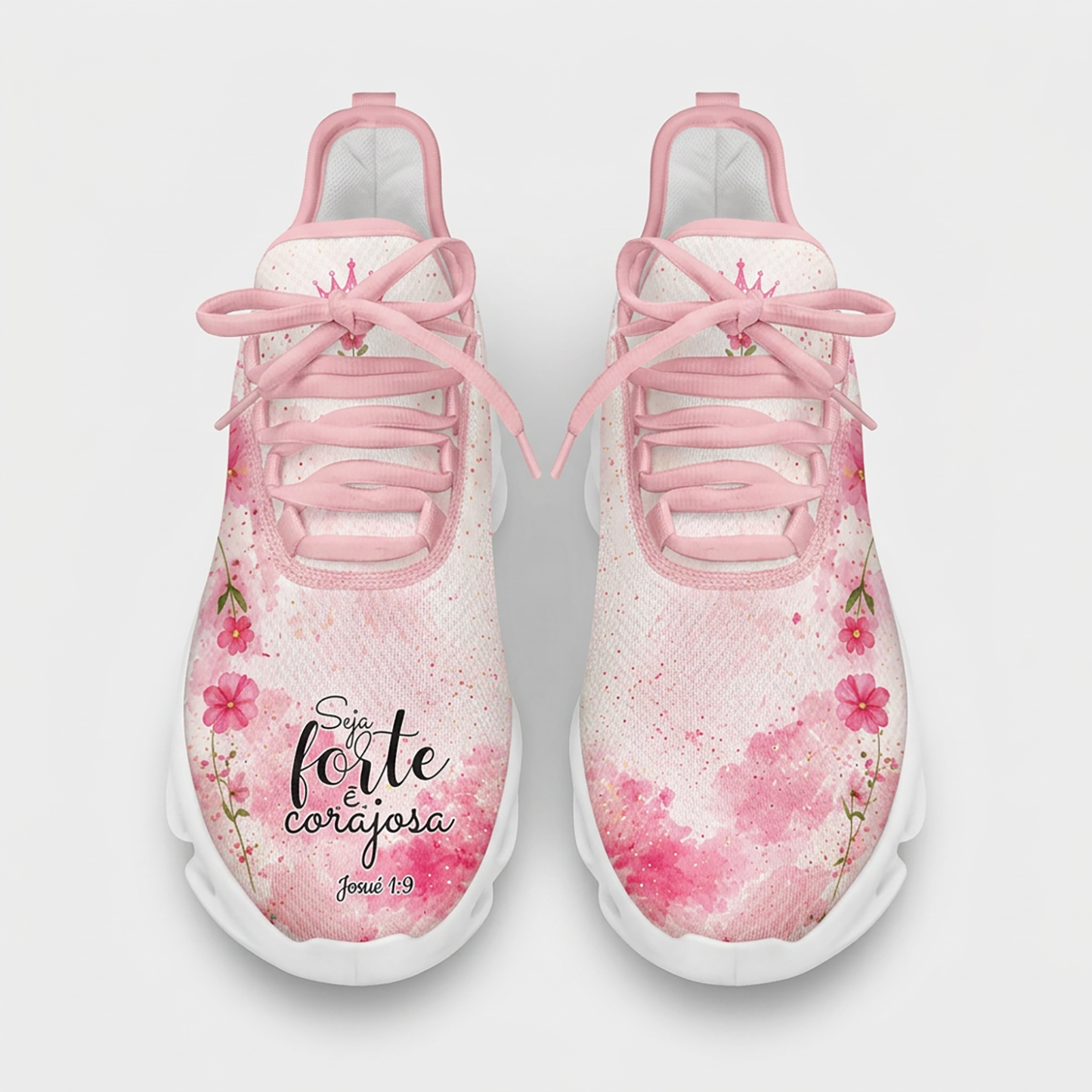 Top-down view of the custom sneakers highlighting the pink watercolor splash gradients, pink laces, and the script text on the toe box