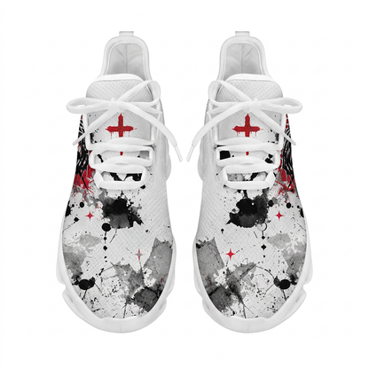 Top-down view of the custom Christian sneakers showing the red cross graphic on the tongue and abstract black ink splatters