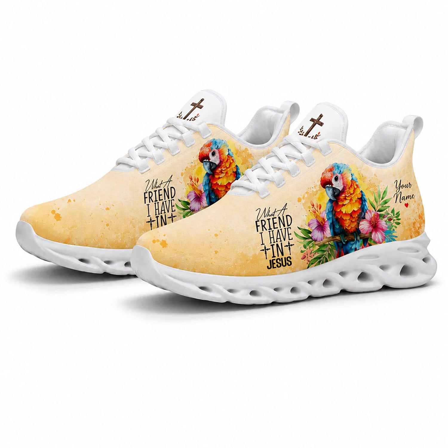 Angled pair of Christian parrot sneakers with watercolor yellow canvas and cross symbols on white soles