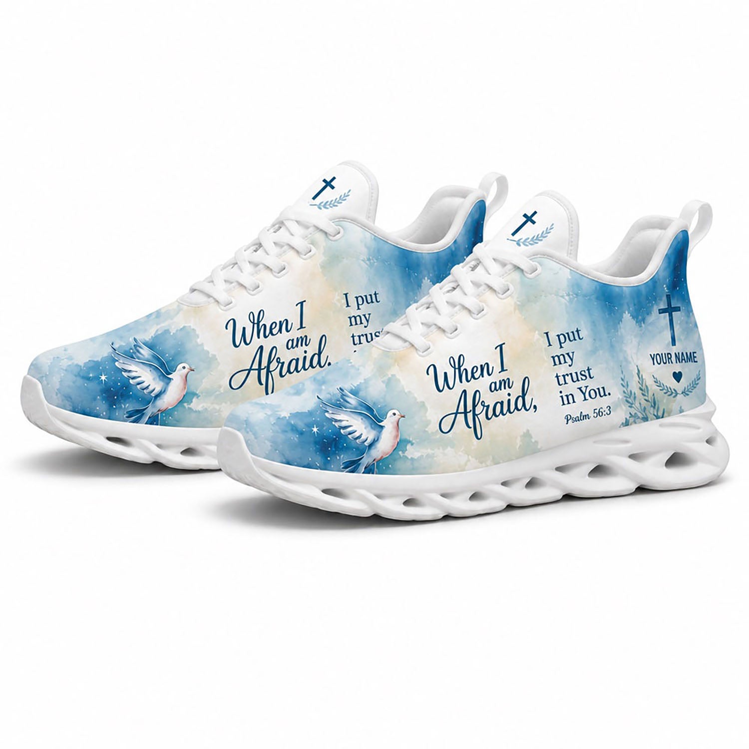 Angled view of a pair of custom Christian blue sneakers with a dove flying graphic and motivational scripture on white soles
