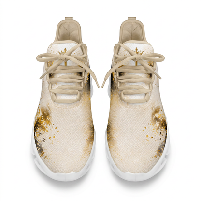 Top-down view of the custom sneakers showcasing the gold glitter paint splatters and a tiny crown logo on the tongue