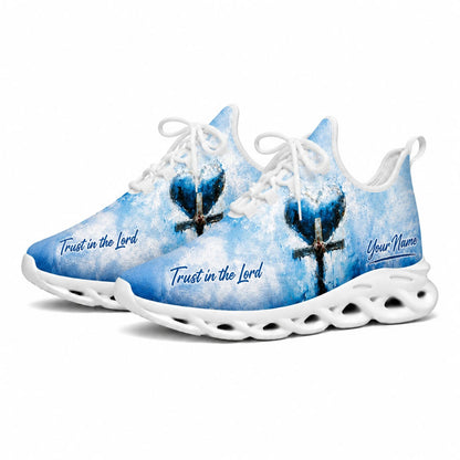 Studio 3/4 angle of Jesus Christ sports sneakers featuring unique abstract heart cross graphics on white soles