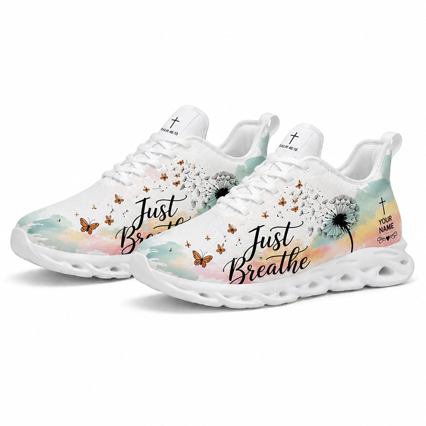 Angled pair of Christian pastel watercolor sneakers with cursive script reading Just Breathe on clean white soles