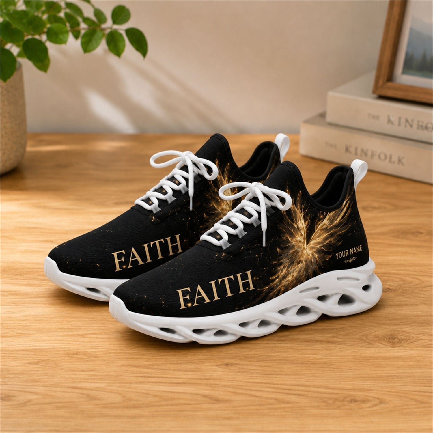 Lifestyle view of white-soled faith sneakers on a wooden surface, highlighting the golden wing art