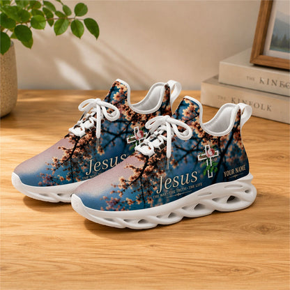 Lifestyle view of white-soled faith sneakers on wood, showcasing floral cross and sky graphic