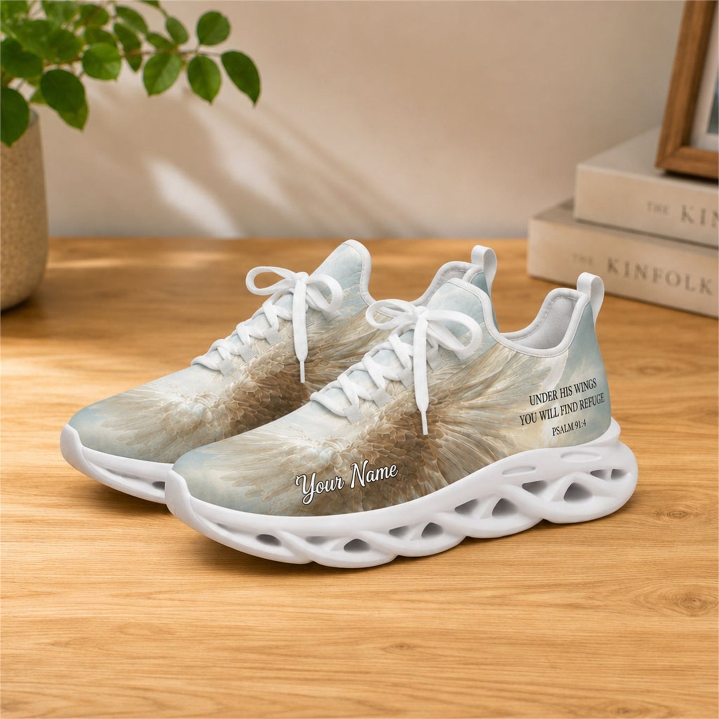 Lifestyle view of white-soled faith sneakers on a wooden surface, highlighting the wing art