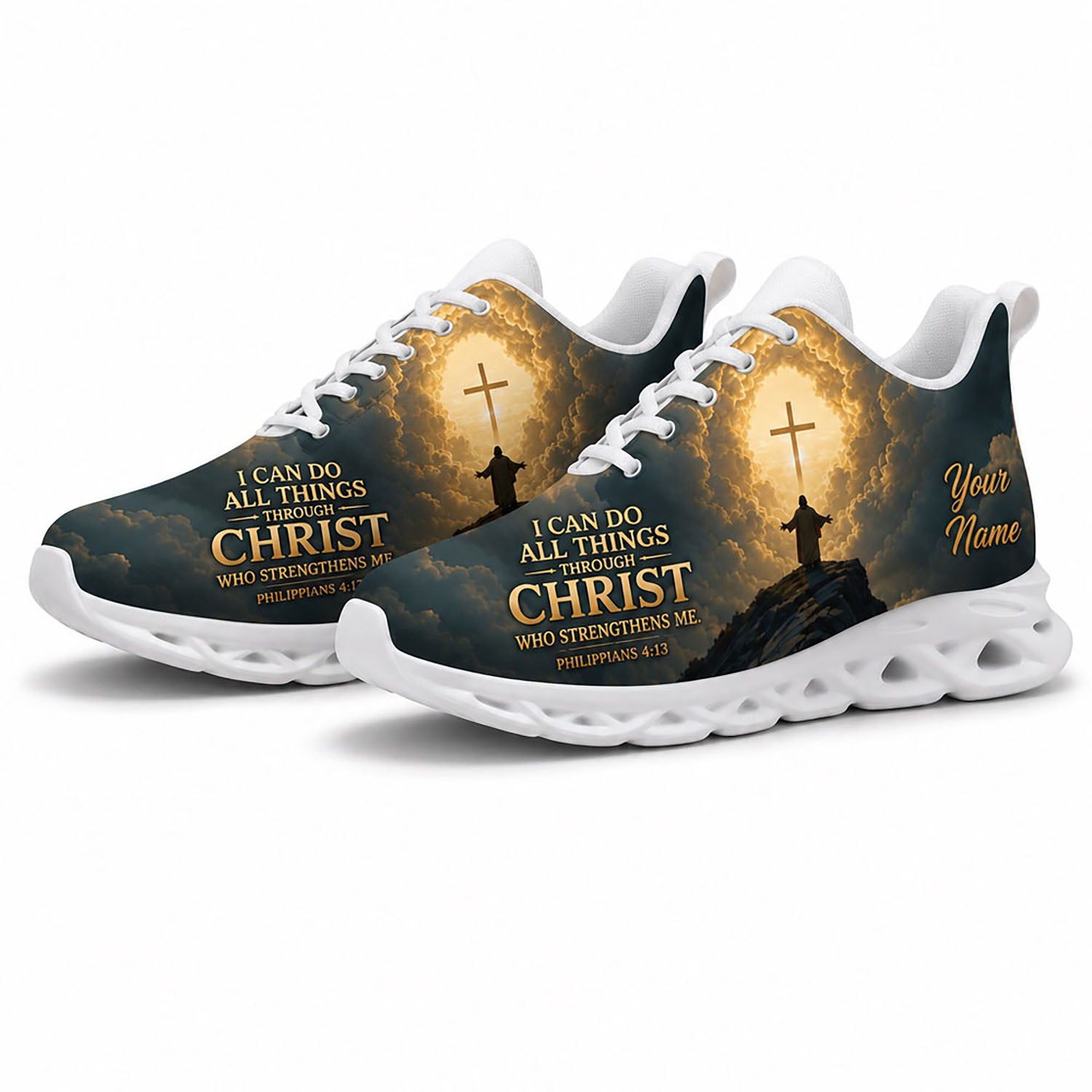 Angled pair of personalized bible sneakers with mountain cross graphic and golden scripture on white soles