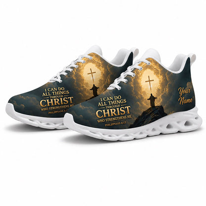 Angled pair of personalized bible sneakers with mountain cross graphic and golden scripture on white soles