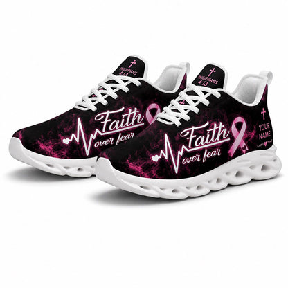 Angled pair of personalized breast cancer awareness sneakers with pink smoke graphics and custom name text on white soles