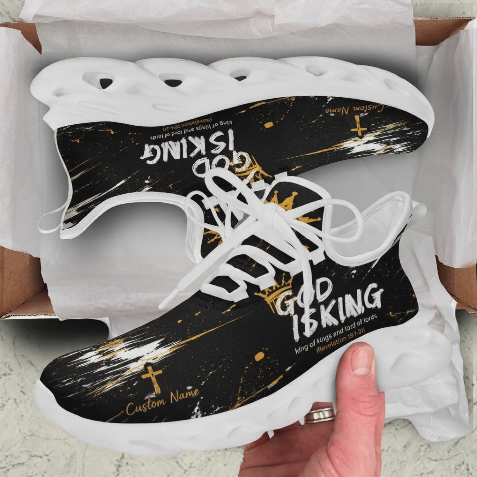 Product showcase video of Custom Name Revelation 19:16 God Is King Max Soul Shoes, demonstrating the dark abstract paint stroke backdrop, gold crown graphics, "King of kings and lord of lords" typography, and the personalizable script name block