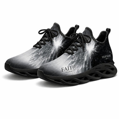 Angled studio shot of black-soled religious footwear featuring the Radiant Wings design