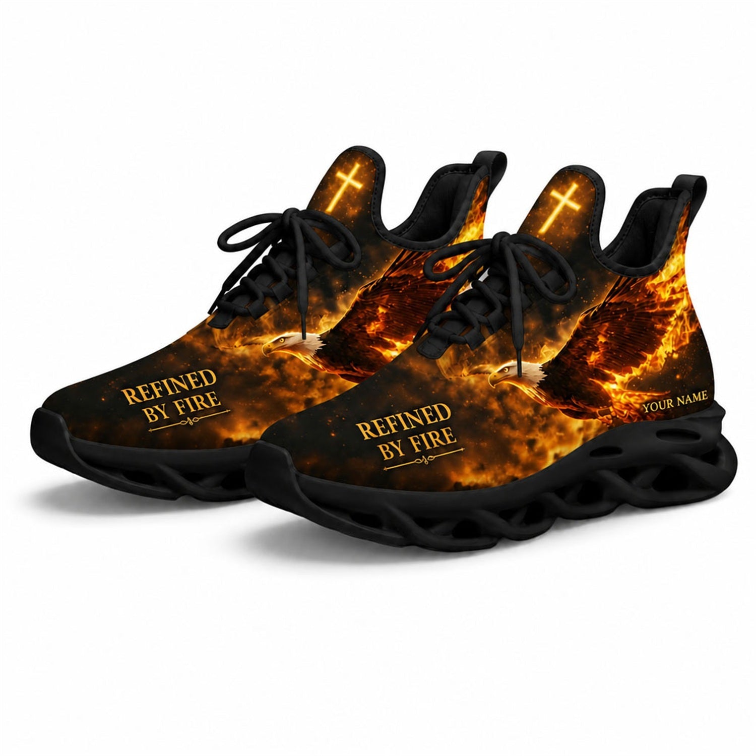 Angled studio shot of the black-soled religious athletic sneakers emphasizing the golden text placement and a bright glowing cross on the tongue
