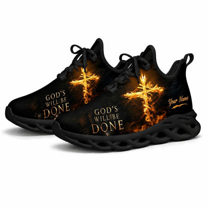 Angled studio shot of black-soled religious footwear highlighting the majestic burning cross design