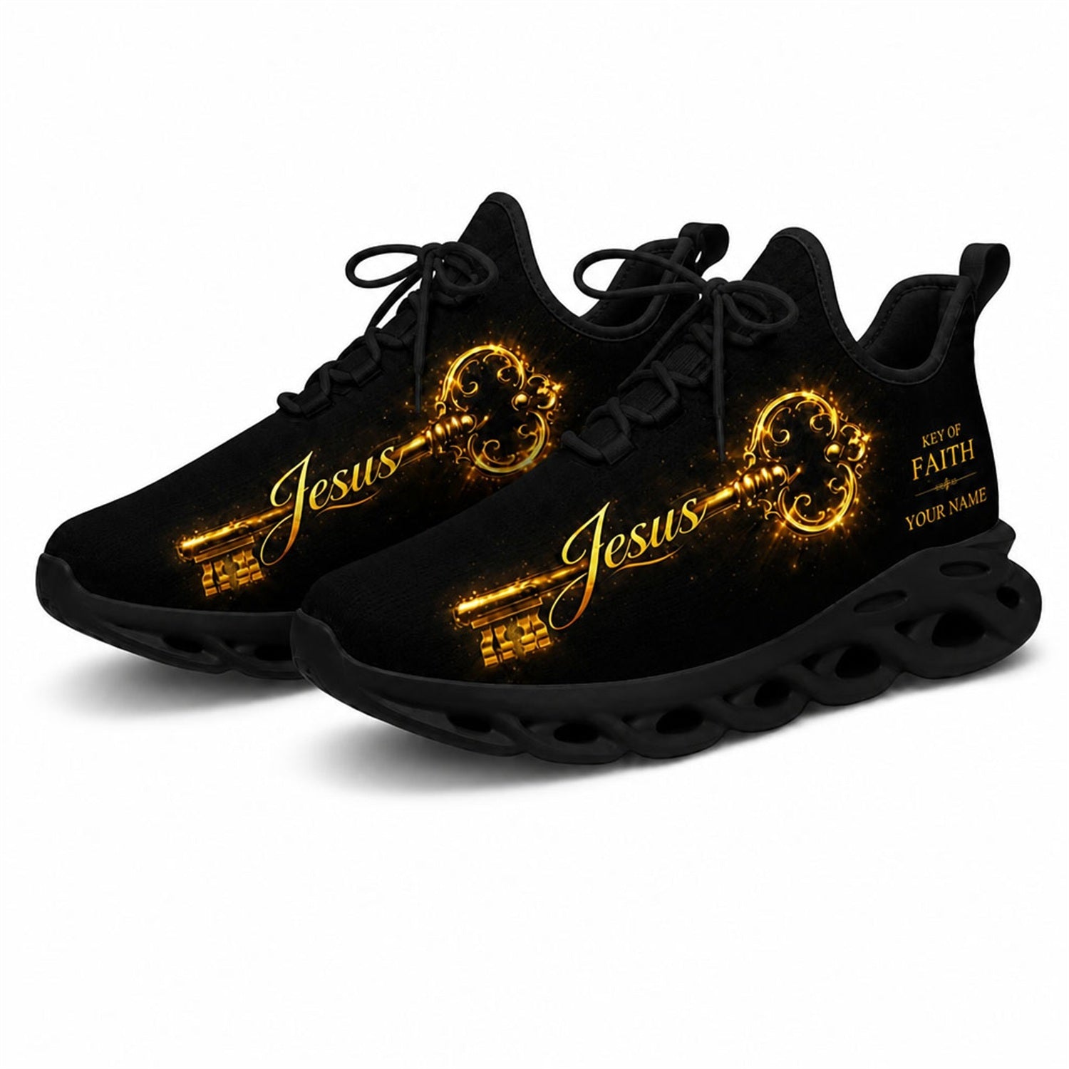 Angled studio shot of black-soled religious footwear highlighting the golden key design