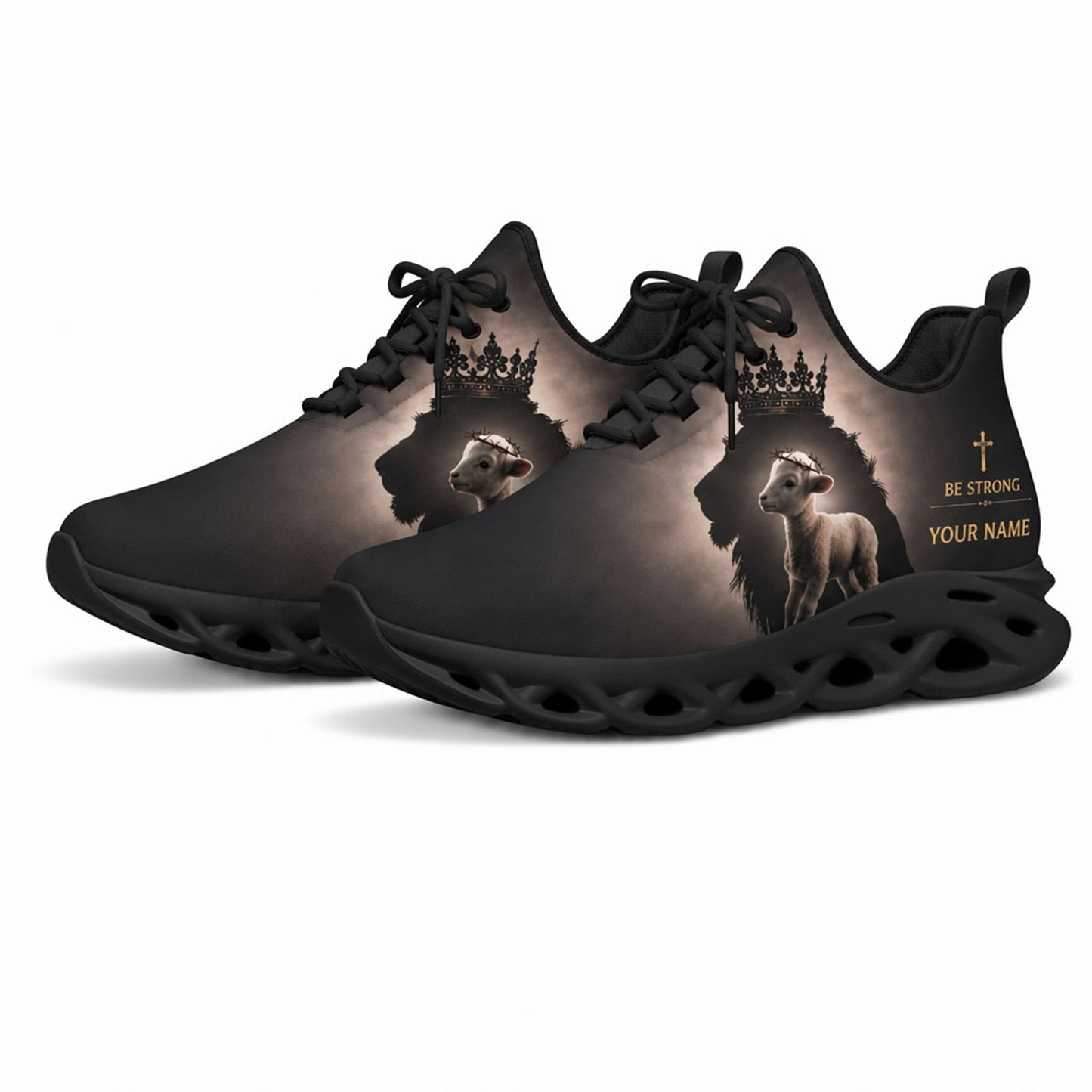 Angled studio shot of black-soled religious sneakers highlighting the crowned lion silhouette graphics