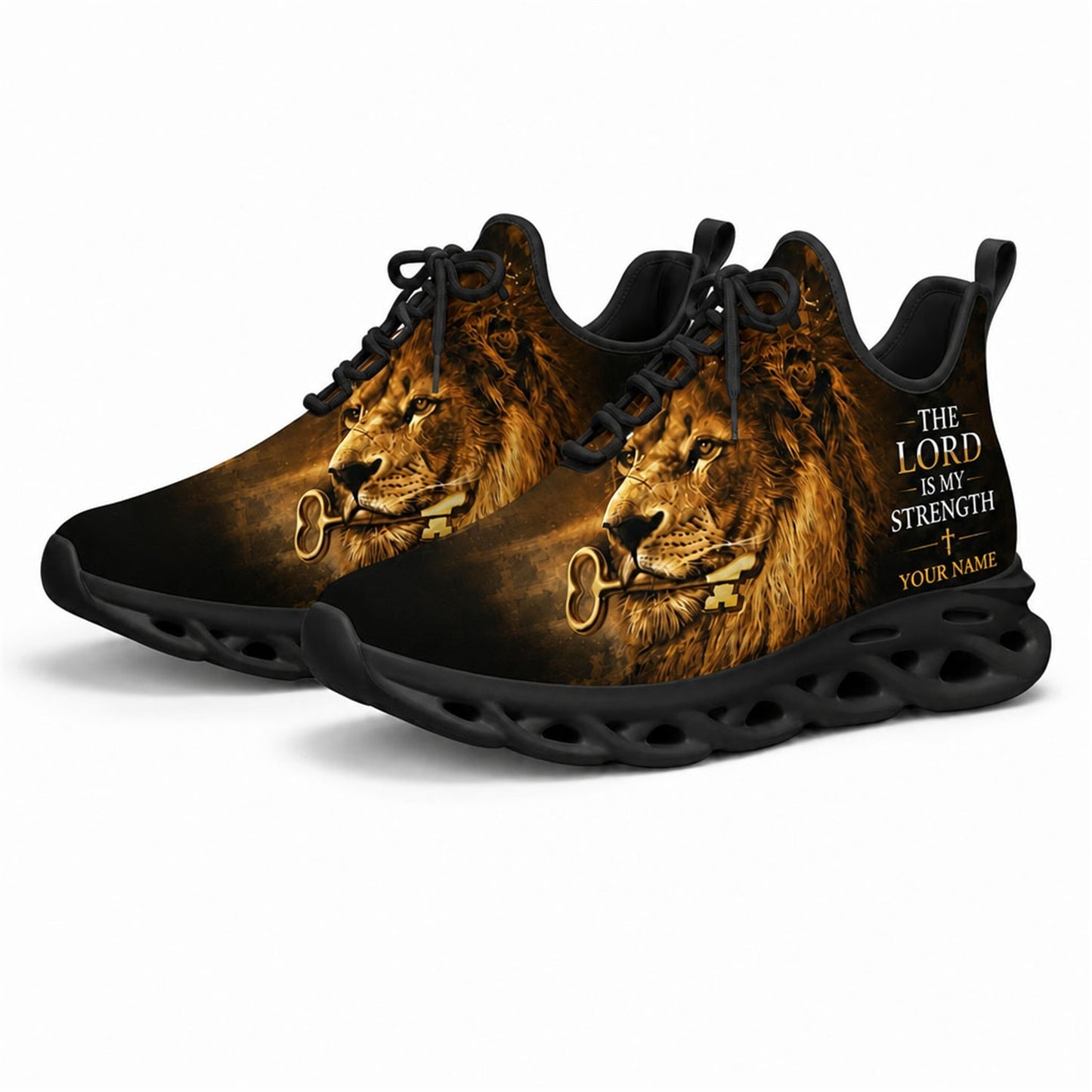 Angled studio shot of black-soled religious sneakers highlighting the lion and holy key design