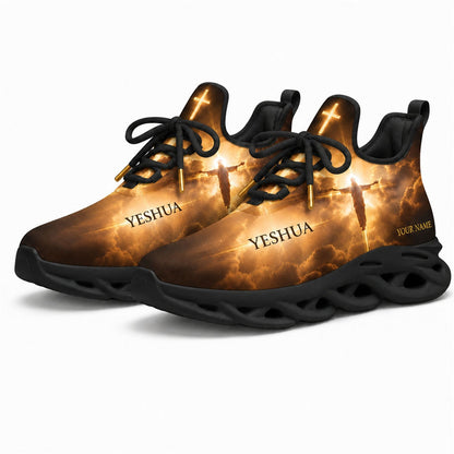 Angled studio shot of black-soled religious footwear featuring the Yeshua divine light design