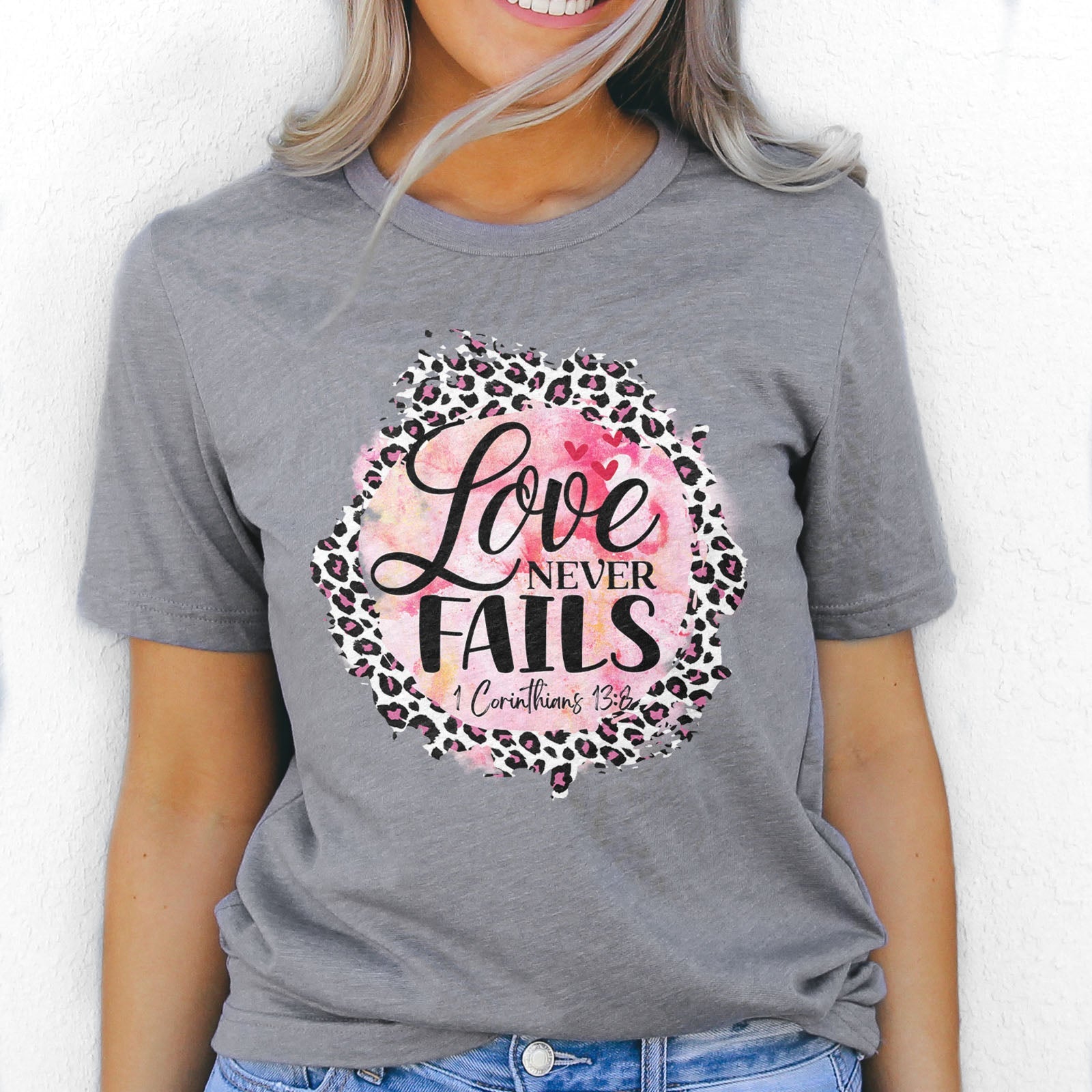 Love Never Fails Pink Leopard 1 Corinthians 13:8 Tee Shirts For Women - Christian Shirts for Women - Religious Tee Shirts